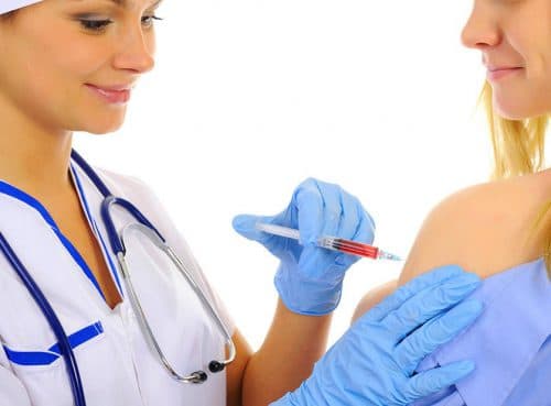When can a nursing mother get a flu shot while breastfeeding?